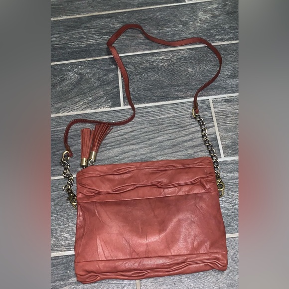 Avant Premiere Rust Colored Magnetic Roll Down Crossbody Bag W/Zip Tassel detail - Picture 3 of 5